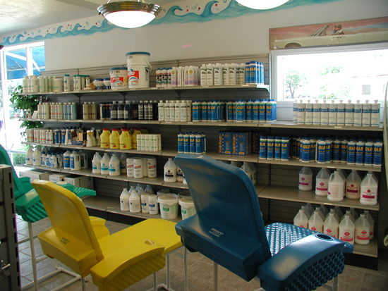 Shelves of pool chemicals and cleaning supplies at the Northern Aire Pools store.